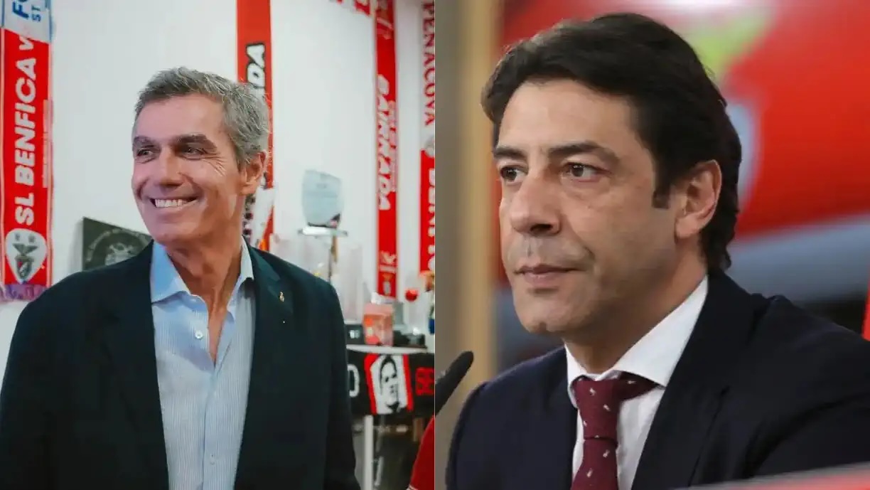 Rui Costa e João Noronha Lopes, principais candidatos à presidência do Benfica, lado a lado, ilustrando a disputa eleitoral referida no artigo.